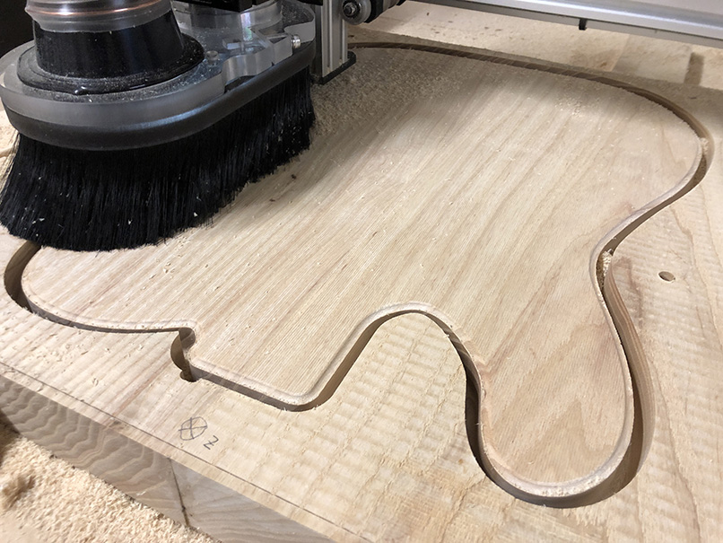 Cutting an electric guitar body on a CNC