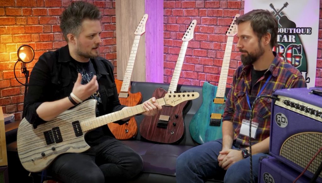Leigh Fuge and Jon Munson with Munson electric guitars