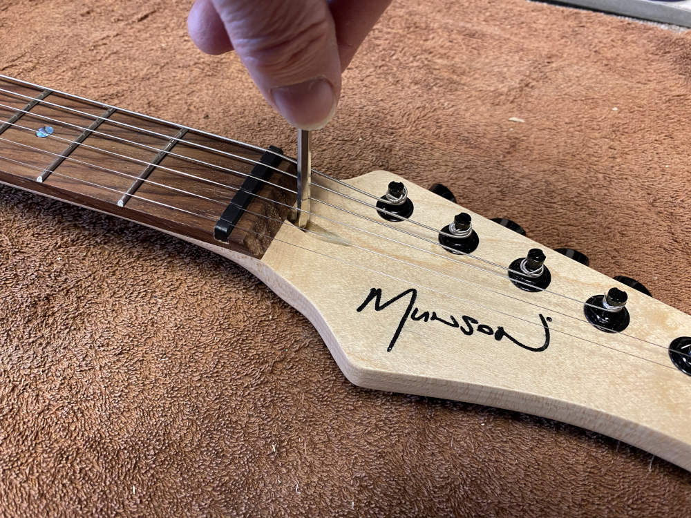 Adjusting guitar neck relief